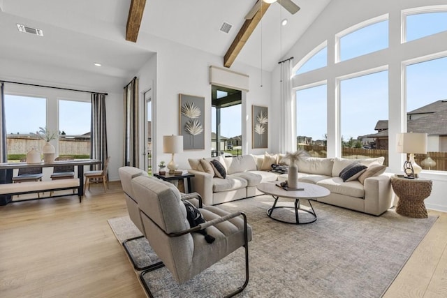 400 Veneta Ln, Georgetown, TX 78633 - living area with light wood-type flooring, beam ceiling, high vaulted ceiling, and a ceiling fan