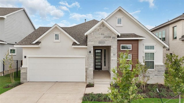 400 Veneta Ln, Georgetown, TX 78633 - view of front of house featuring a shingled roof, stone siding, stucco siding, and concrete driveway