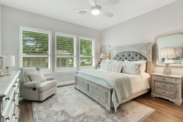 121 Monterey Oak Trl, Georgetown, TX 78628 - bedroom with visible vents, ceiling fan, and light wood-style flooring