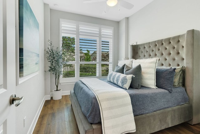 121 Monterey Oak Trl, Georgetown, TX 78628 - bedroom featuring baseboards, wood finished floors, and ceiling fan
