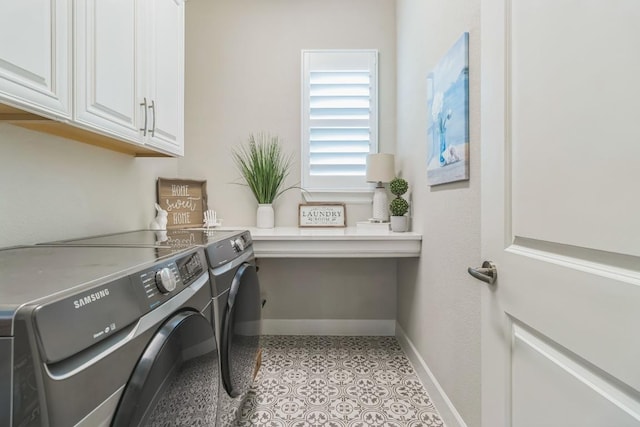 121 Monterey Oak Trl, Georgetown, TX 78628 - clothes washing area featuring baseboards, washer and dryer, and cabinet space