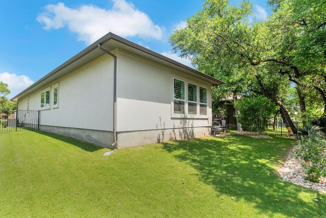 121 Monterey Oak Trl, Georgetown, TX 78628 - view of property exterior with fence, stucco siding, cooling unit, and a lawn