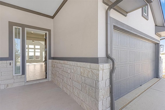 508 Raleigh Dr, Georgetown, TX 78633 - view of exterior entry featuring stucco siding and an attached garage