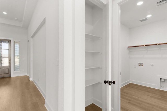 508 Raleigh Dr, Georgetown, TX 78633 - washroom featuring hookup for a gas dryer, wood finished floors, recessed lighting, and hookup for a washing machine