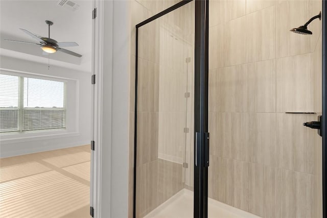508 Raleigh Dr, Georgetown, TX 78633 - bathroom with a stall shower and a ceiling fan