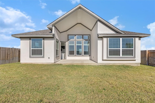 508 Raleigh Dr, Georgetown, TX 78633 - back of house featuring stucco siding, a fenced backyard, a patio area, and a shingled roof