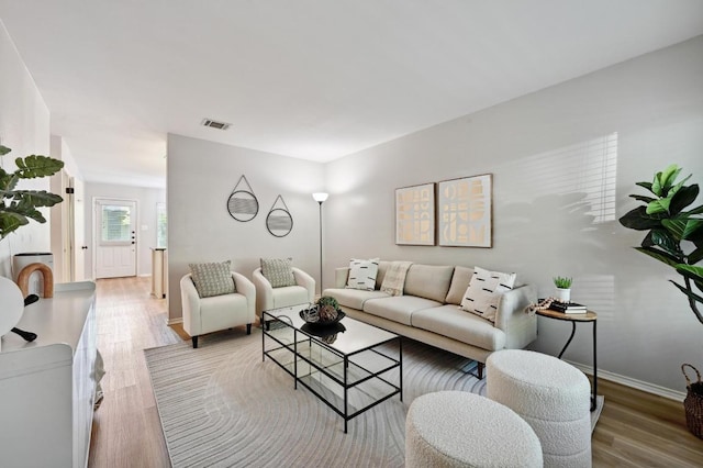 3309 Clawson Rd, Austin, TX 78704 - living area featuring baseboards and wood finished floors