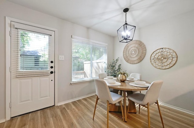 3309 Clawson Rd, Austin, TX 78704 - dining space with a chandelier, light wood finished floors, baseboards, and plenty of natural light
