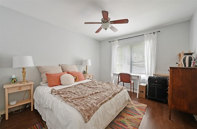 bedroom with a ceiling fan and wood finished floors