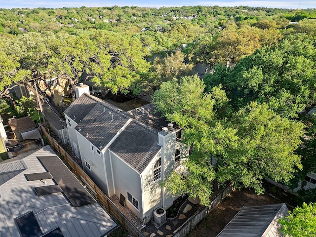 aerial view with a wooded view