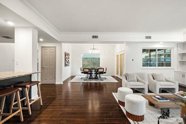 1702 Newning Ave Unit B, Austin, TX 78704 - living room with dark wood-style flooring, crown molding, baseboards, and recessed lighting