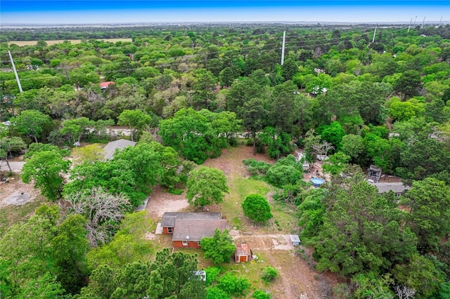 aerial view featuring a view of trees