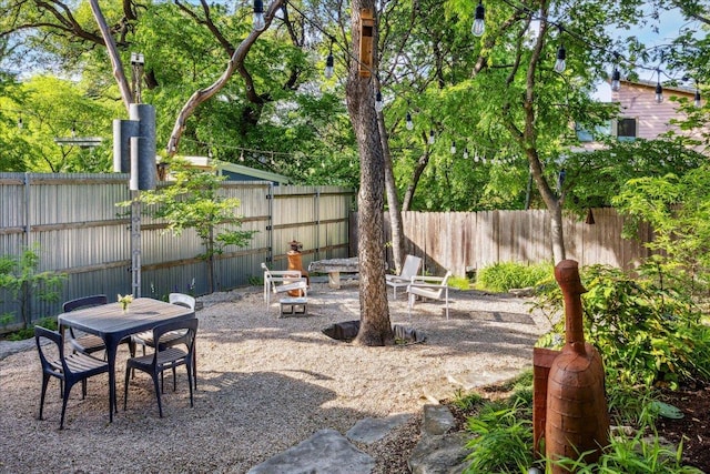 1008 W Monroe St W, Austin, TX 78704 - fenced backyard with a patio area and outdoor dining area