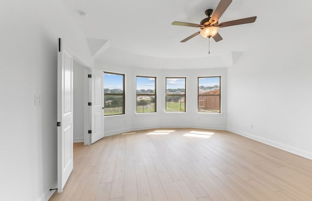 6517 Apache Plum Ln, Spicewood, TX 78669 - spare room featuring a ceiling fan, light wood-type flooring, and a smoke detector