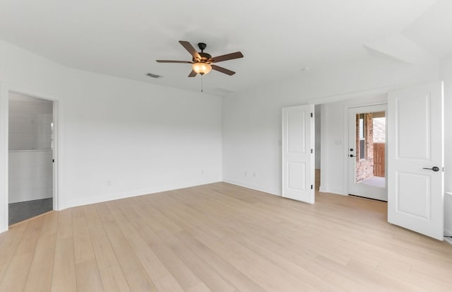 6517 Apache Plum Ln, Spicewood, TX 78669 - spare room featuring a ceiling fan and light wood-style flooring