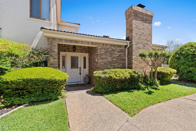 1101 Lakeway Dr Unit D, Lakeway, TX 78734 - entrance to property with a chimney and stucco siding