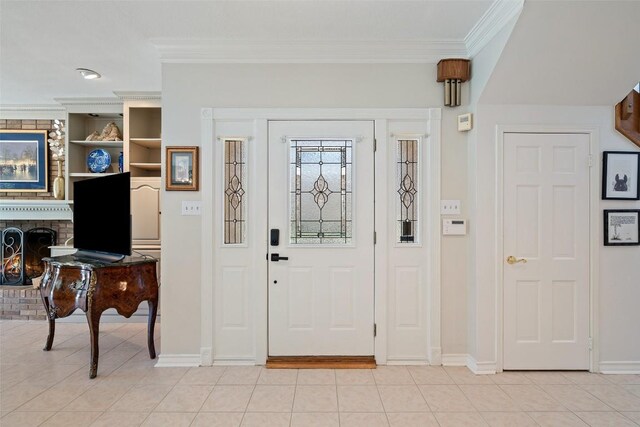 1101 Lakeway Dr Unit D, Lakeway, TX 78734 - entryway with ornamental molding, light tile patterned floors, and a brick fireplace