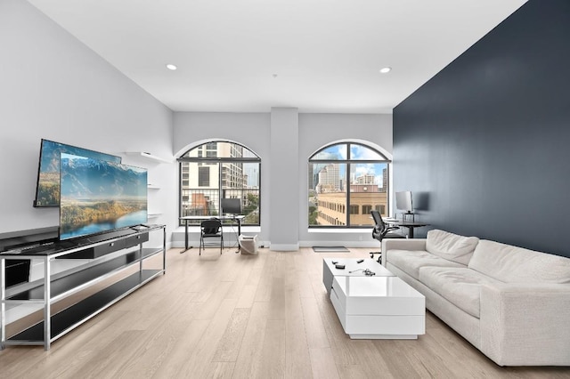 507 Sabine St Unit 505, Austin, TX 78701 - living room with wood finished floors and recessed lighting