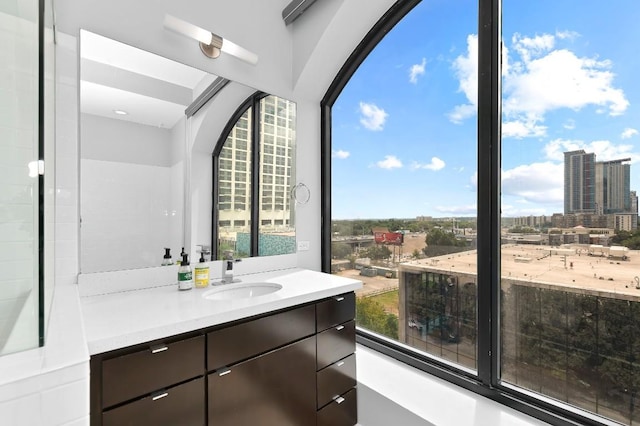 507 Sabine St Unit 505, Austin, TX 78701 - bathroom featuring vanity and a city view