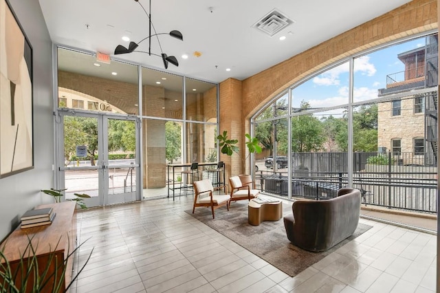 507 Sabine St Unit 505, Austin, TX 78701 - common area with a towering ceiling and floor to ceiling windows