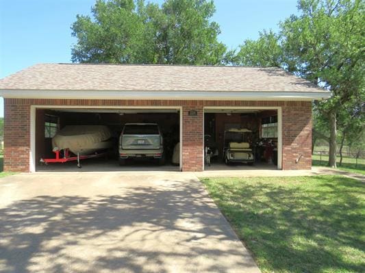 exterior space featuring concrete driveway