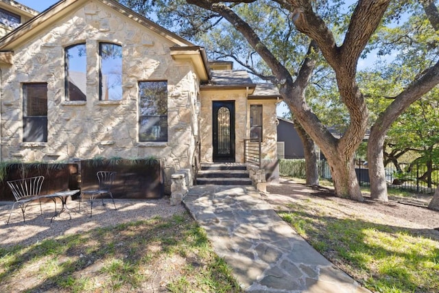 1018 Harwood Pl, Austin, TX 78704 - view of front facade featuring stone siding