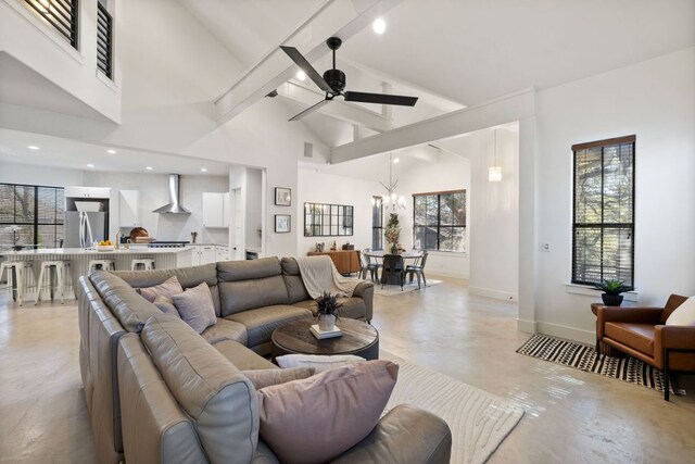 1018 Harwood Pl, Austin, TX 78704 - living area with concrete floors, ceiling fan, high vaulted ceiling, a chandelier, and beam ceiling