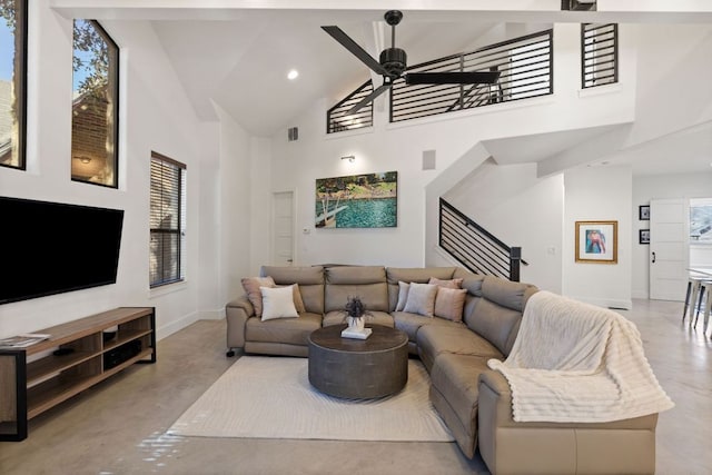 1018 Harwood Pl, Austin, TX 78704 - living room featuring a ceiling fan, high vaulted ceiling, stairway, concrete floors, and recessed lighting