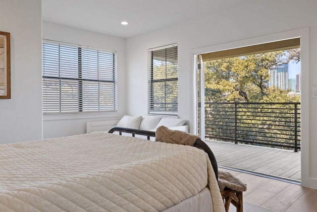 1018 Harwood Pl, Austin, TX 78704 - bedroom with wood finished floors, access to outside, and recessed lighting