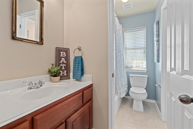 bathroom featuring visible vents, toilet, shower / bath combo with shower curtain, vanity, and tile patterned floors
