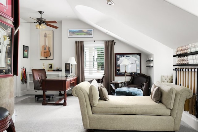 living room with carpet flooring, a ceiling fan, and lofted ceiling