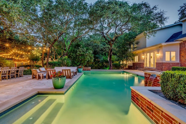 2601 Buckminister Ct, Austin, TX 78746 - swimming pool featuring a patio and an outdoor hangout area