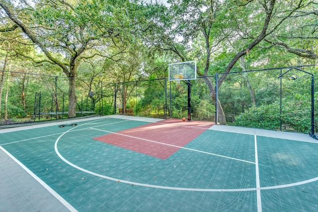 2601 Buckminister Ct, Austin, TX 78746 - view of basketball court featuring community basketball court and a view of trees