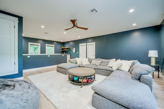 2601 Buckminister Ct, Austin, TX 78746 - living room with wood finished floors, a ceiling fan, recessed lighting, and baseboards