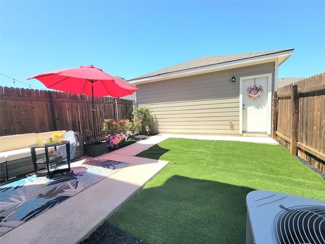 1765 Yaupon Grove Ln, Leander, TX 78641 - fenced backyard featuring an outdoor living space, an outdoor structure, and a patio