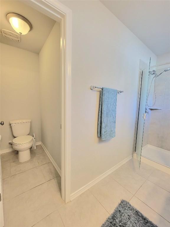 1765 Yaupon Grove Ln, Leander, TX 78641 - full bath featuring tile patterned flooring and a stall shower