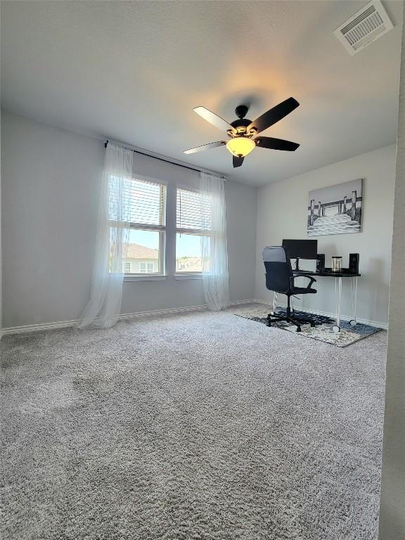 1765 Yaupon Grove Ln, Leander, TX 78641 - office space featuring a ceiling fan and carpet flooring