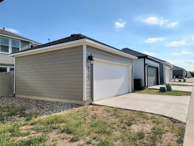 1765 Yaupon Grove Ln, Leander, TX 78641 - view of side of home featuring a garage