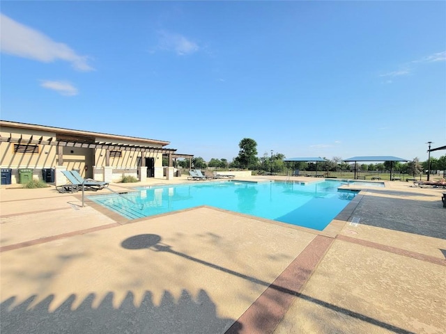1765 Yaupon Grove Ln, Leander, TX 78641 - community pool featuring a patio area