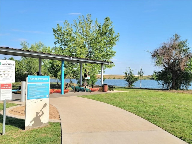 1765 Yaupon Grove Ln, Leander, TX 78641 - view of home's community featuring a lawn and a water view