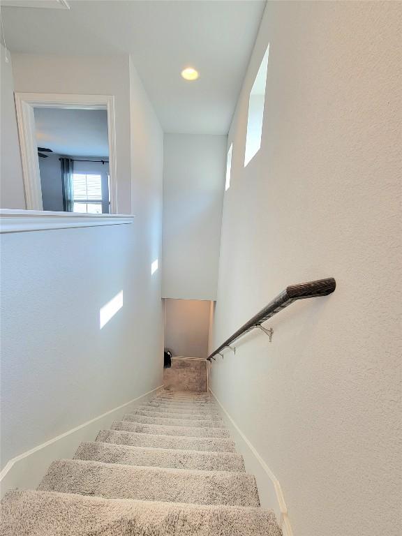1765 Yaupon Grove Ln, Leander, TX 78641 - staircase with carpet flooring and recessed lighting
