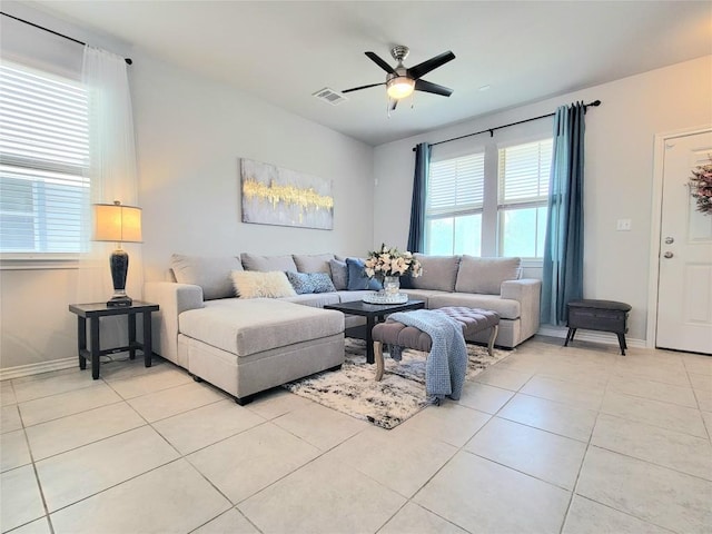 1765 Yaupon Grove Ln, Leander, TX 78641 - living area featuring light tile patterned flooring and ceiling fan
