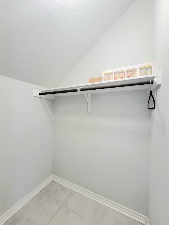 1765 Yaupon Grove Ln, Leander, TX 78641 - walk in closet featuring vaulted ceiling