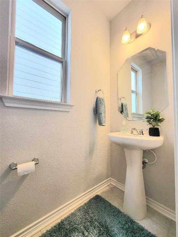 1765 Yaupon Grove Ln, Leander, TX 78641 - bathroom featuring tile patterned flooring