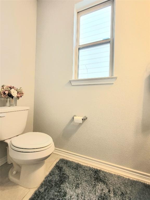 1765 Yaupon Grove Ln, Leander, TX 78641 - bathroom with tile patterned floors and baseboards