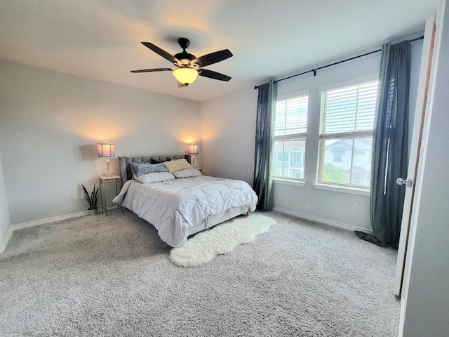 1765 Yaupon Grove Ln, Leander, TX 78641 - carpeted bedroom featuring baseboards and ceiling fan