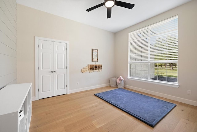 113 Oak Plaza Dr, Georgetown, TX 78628 - interior space with light wood-style flooring, a ceiling fan, and baseboards