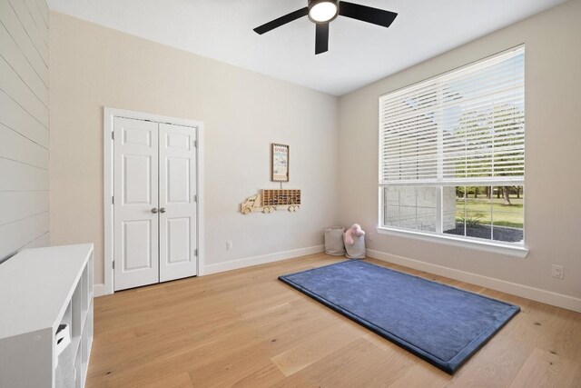 113 Oak Plaza Dr, Georgetown, TX 78628 - exercise area with ceiling fan, light wood-type flooring, and baseboards