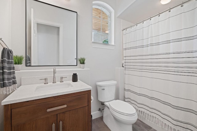 113 Oak Plaza Dr, Georgetown, TX 78628 - bathroom with toilet, vanity, tile patterned flooring, and a shower with curtain