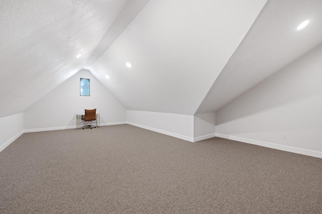113 Oak Plaza Dr, Georgetown, TX 78628 - additional living space featuring carpet flooring, baseboards, and vaulted ceiling